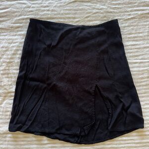Reformation black mini skirt (size 0)